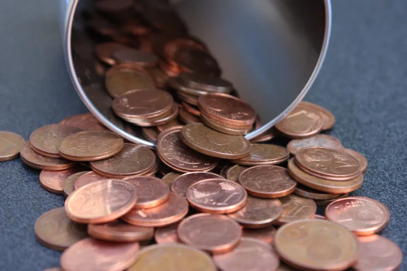 euro coins yellow coins make a donation