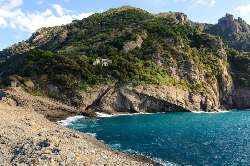 sea and promontory of portofino seen from punta chiappa