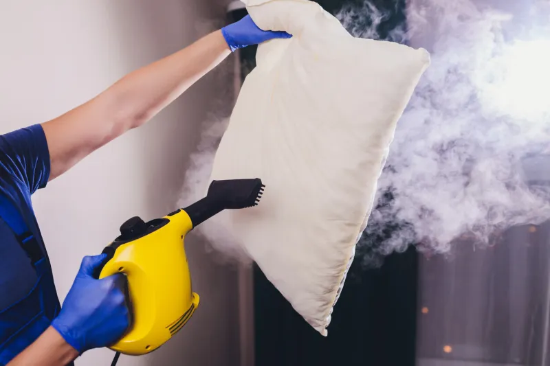 using dry steam cleaner to sanitize pillow