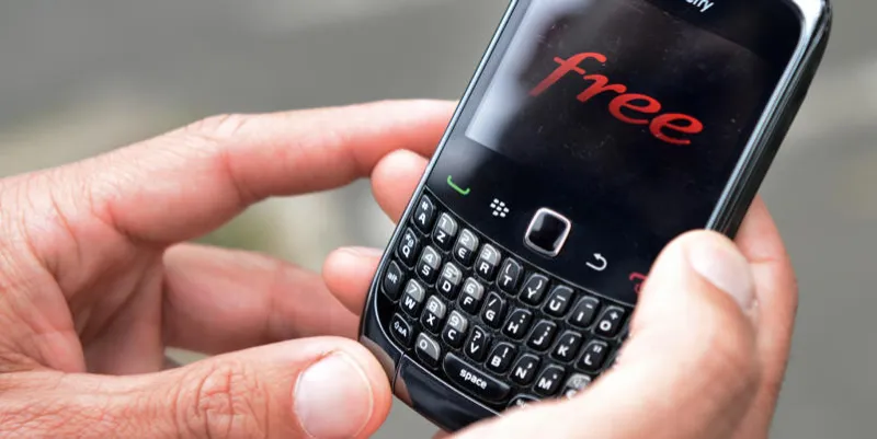 a person holds a mobile phone connected to french telecoms operator and internet service provider free mobile, on july 20, 2012 in the french western city of rennes afp photo   damien meyer