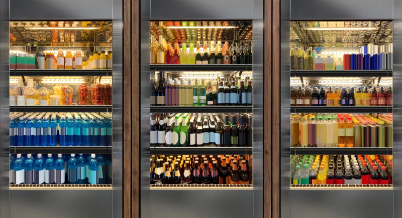 glass door fridges photo mockup soda pop cans, vine and beer bottles in vertical freezer at airport restaurantsuitable for presenting new cans and bottles among many others