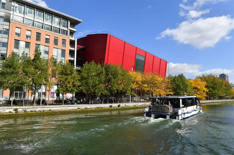 aubervilliers, france-10 06 2022  boat full of passengers on the canal de la villette in aubervilliers, in the suburbs of paris, france