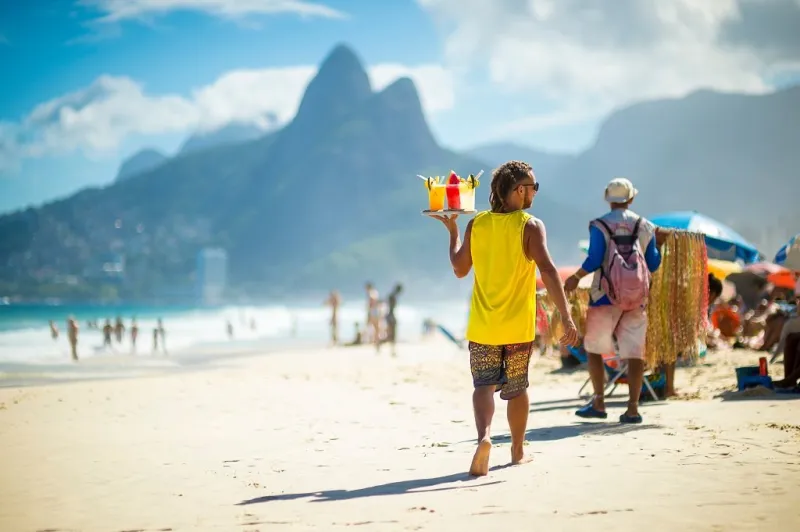 scenic afternoon view of ipanema beach with two brothers mountai
