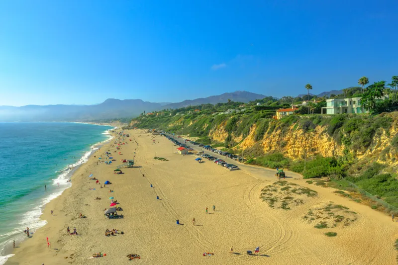 aerial view of pacific coast at point dume beach from point dume promontory on malibu, pacific ocean in ca, united states california west coast blue sky, summer season in sunny day copy space