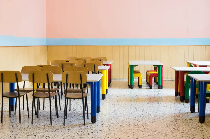 lunchroom of the refectory of the kindergarten with small benches and small chairs