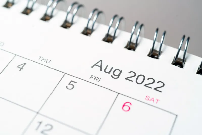 august 2022 on desk calendar close up