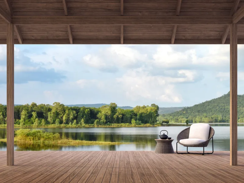 wood terrace with beautiful lake and mountain view 3d render,there are old wood terrace floor,decorate with rattan lounge chair,surrounded by nature