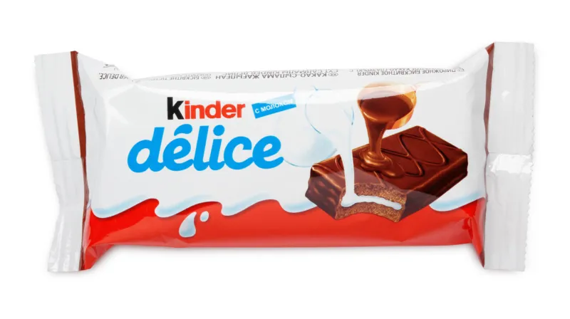 tula, russia - april 14, 2014  kinder delice chocolate candy bar made by ferrero isolated on white background