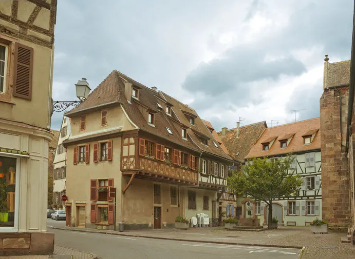 street with picturesque historical buildings in selestat, france