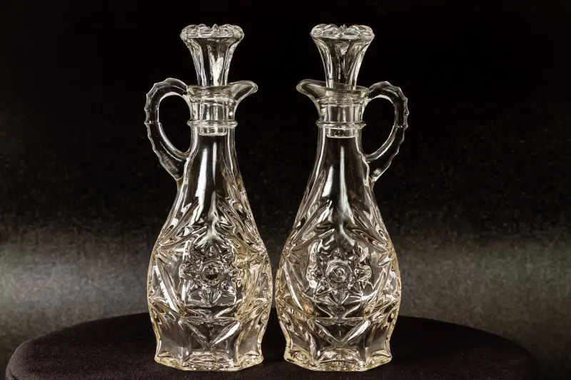 two glass decanters used for various liquids