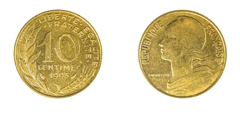 french 10 centimes coin year 1993 obverse and reverse side on white background,macro close-up