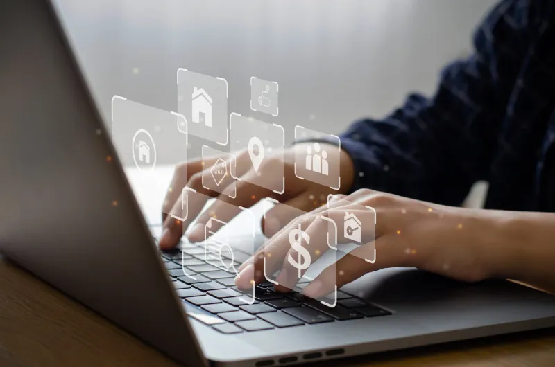 male businessman using computer to sell and advertise real estate brokers and contractors residential real estate investment icon housing project real estate development real estate buy a house online