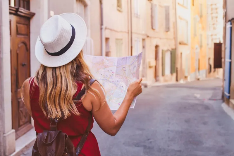 travel to europe, tourist looking at map on the street, summer holidays sightseeing tourism