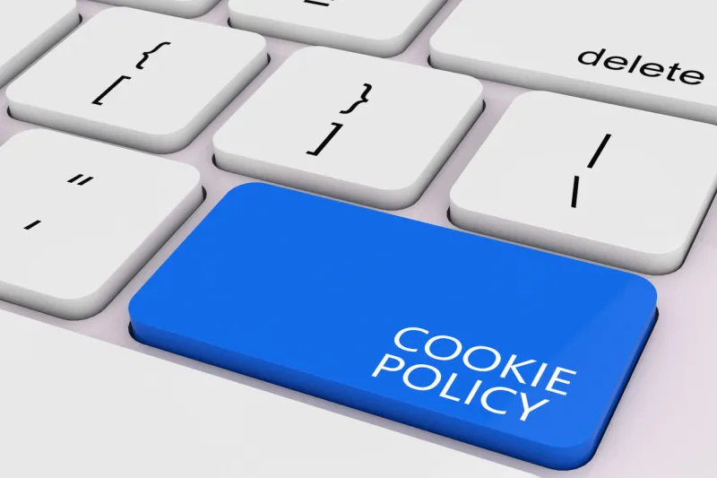 blue cookie policy key on white pc keyboard extreme closeup 3d rendering