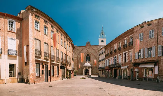perpignan, france leon gambetta square and cathedral basilica of saint john the baptist of perpignan in sunny summer day
