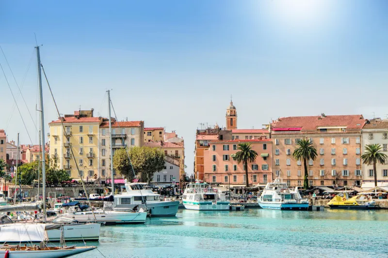 ajaccio, corsica, france - september, 13, 2016  ajaccio port cityscape with moored yachts and pleasure boats , corsica island, france