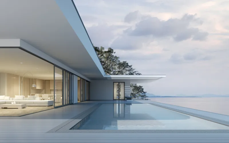 perspective of modern building with terrace and swimming pool on sea view background,idea of family vacation 3d rendering