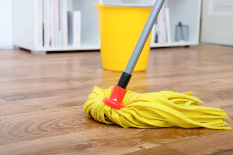 cleaning tools on parquet floor