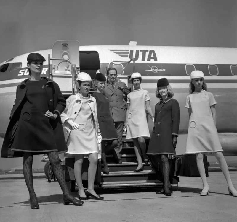 french designer pierre cardin presents the new uniforms of uta' s flight attendants, at le bourget airport, 09 may 1968 afp photo (photo by afp)