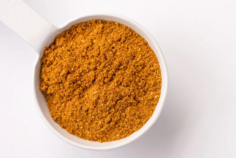ras el hanout seasoning in a teaspoon