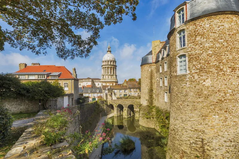 boulogne-sur-mer, france – september 20, 2018  fortified city with castle in foreground and basilica of our lady of the immaculate conception in background