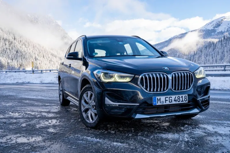 brand new black bmw x1 suv 2020 parked in switzerland by the hig