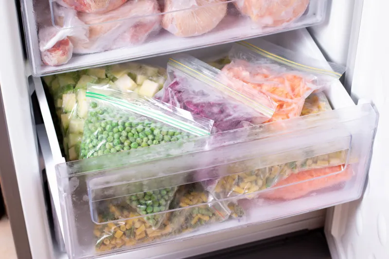 assortment of frozen vegetables in home fridge frozen food in the freezer