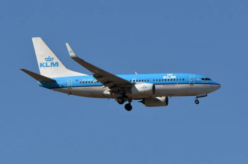 this photo taken on august 27, 2018 shows a boeing 737 next gen of klm as it flies above toulouse, southern france (photo by pascal pavani   afp)