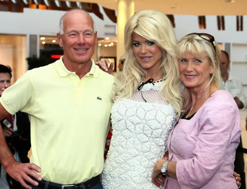 victoria silvstedt poses with her parents, bo and ulla silvstedt, as she models and shops at nacka forum shopping mall, outside stockholm, sweden on may 16, 2009 photo by david sica stella pictures abacapresscom