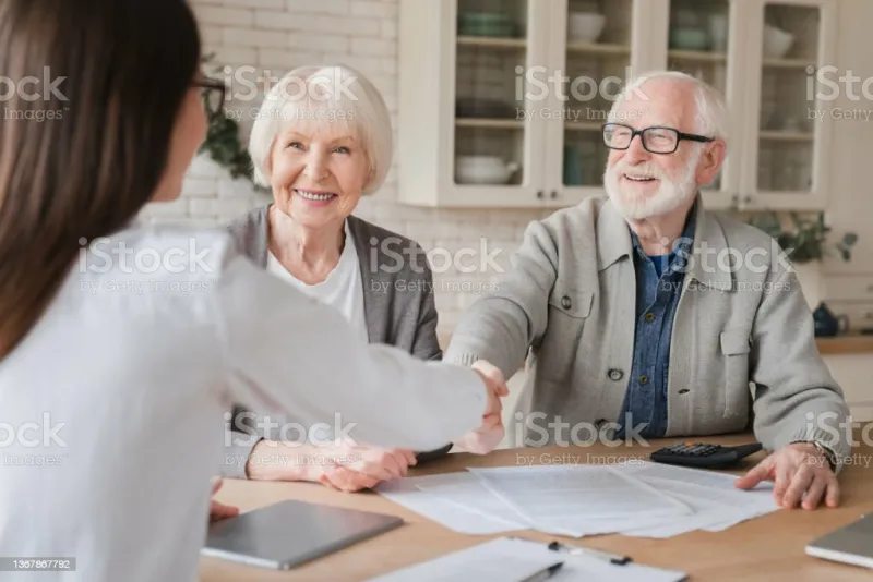 happy old elderly senior grandparents family couple clients signs financial insurance, pension, startup, dealing handshake agent lawyer, agreement with customers on investment contract, bank manager