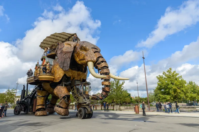 nantes, france - circa september 2015  the great elephant goes for a walk with passengers aboard