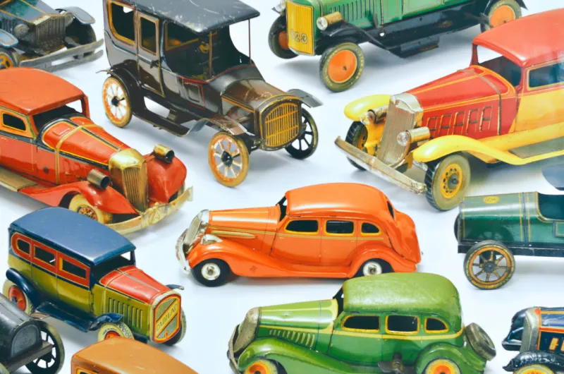 antique old vintage toy cars isolated on white