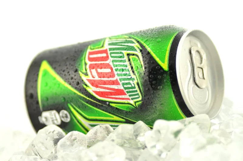 kwidzyn, poland - march 15, 2014  can of mountain dew drink isolated on white mountain dew citrus-flavored soft drink produced by pepsico mountain dew was introduced in