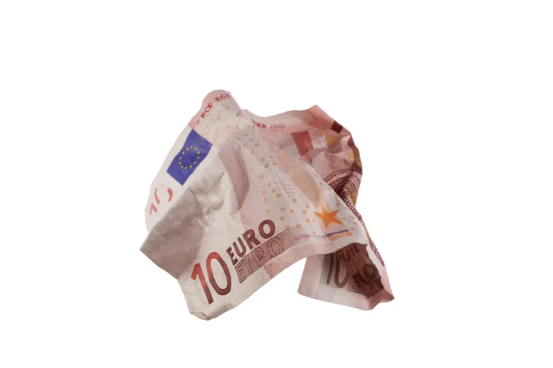 crumpled ten euro bill