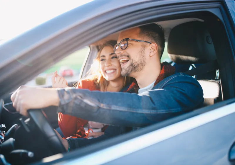 couple driving in car