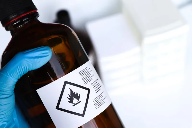 flammable liquid symbol on the chemical bottle, hazardous chemicals in the industry