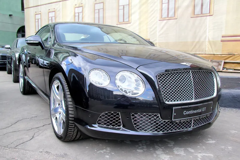 moscow, russia - june 2, 2013  brand new british supercar bentley continental gt parked at the city street