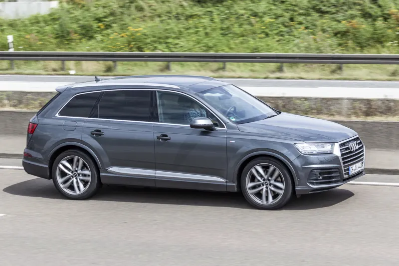 frankfurt, germany - july 12, 2016  audi q7 luxury suv driving on the highway