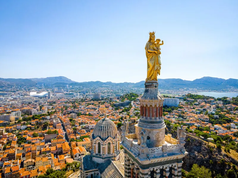 the aerial view of basilique notre-dame-de-la-garde in marseille, a port city in southern france