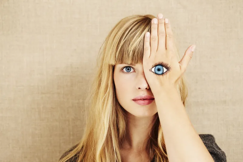 beautiful blond woman with painted eye