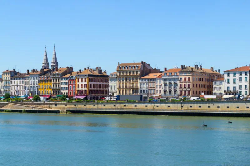 city of macon with saone river in burgundy, france