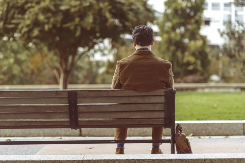 a man takes time to relax in the lower senate park on capitol hill in washington, dc