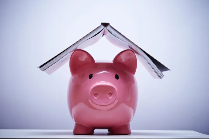 piggy bank with books