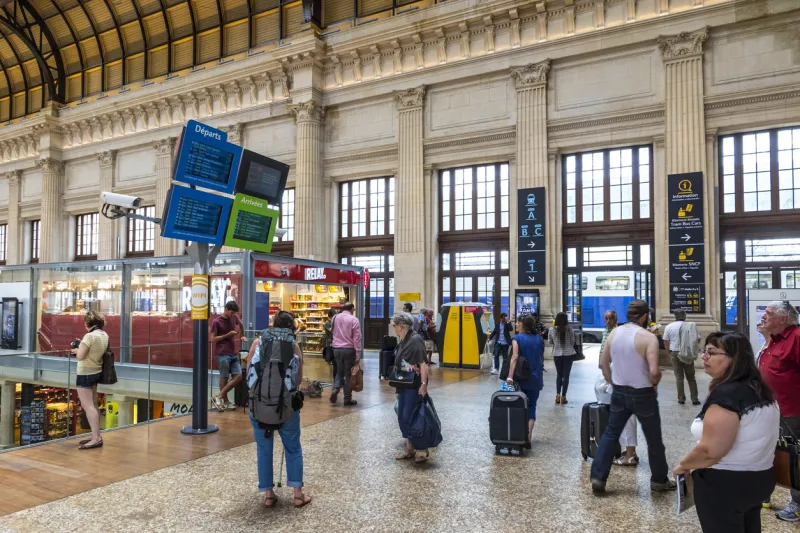 bordeaux, france - june 13, 2017  people waiting for trains at the main hall of bordeaux main railway station bordeaux-saint-jean (gare sncf) the current station building opened in