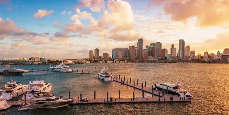 downtown miami, florida, usa, and the port, seen from macarthur causeway at sunset