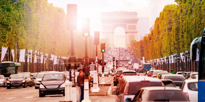 traffic jam on the way toward triumphal arc in paris at the sunny autumn day
