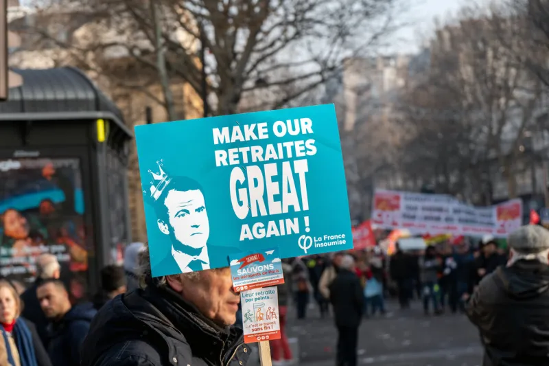 paris, france - january 24 2020   protest against the retirement pension reform of president macron - protestor with a make our retirement great again sign