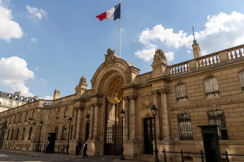 paris, france - june 17, 2021  facade of the elysée palace official residence of the president of the french republic rue saint honoré in paris in good weather with french flag flying in the wind