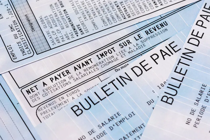 close up on a french payroll with social contributions and income tax deduction, mandatory in france since january