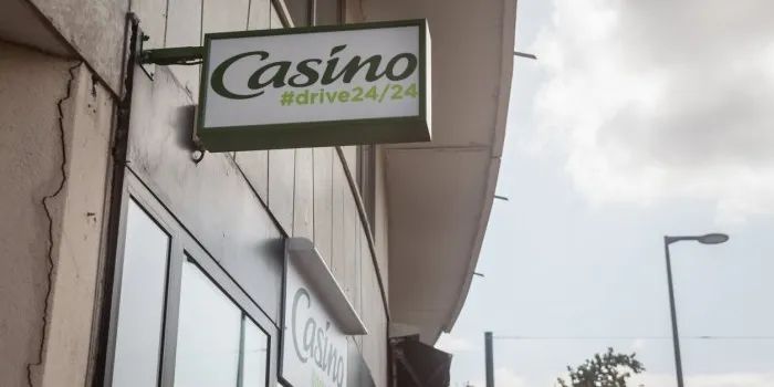picture of a sign with the logo of casino on their local supermarket in lyon, france casino group or casino guichard-perrachon is a french mass-retail group of supermarkets, hypermarkets and convenience stores